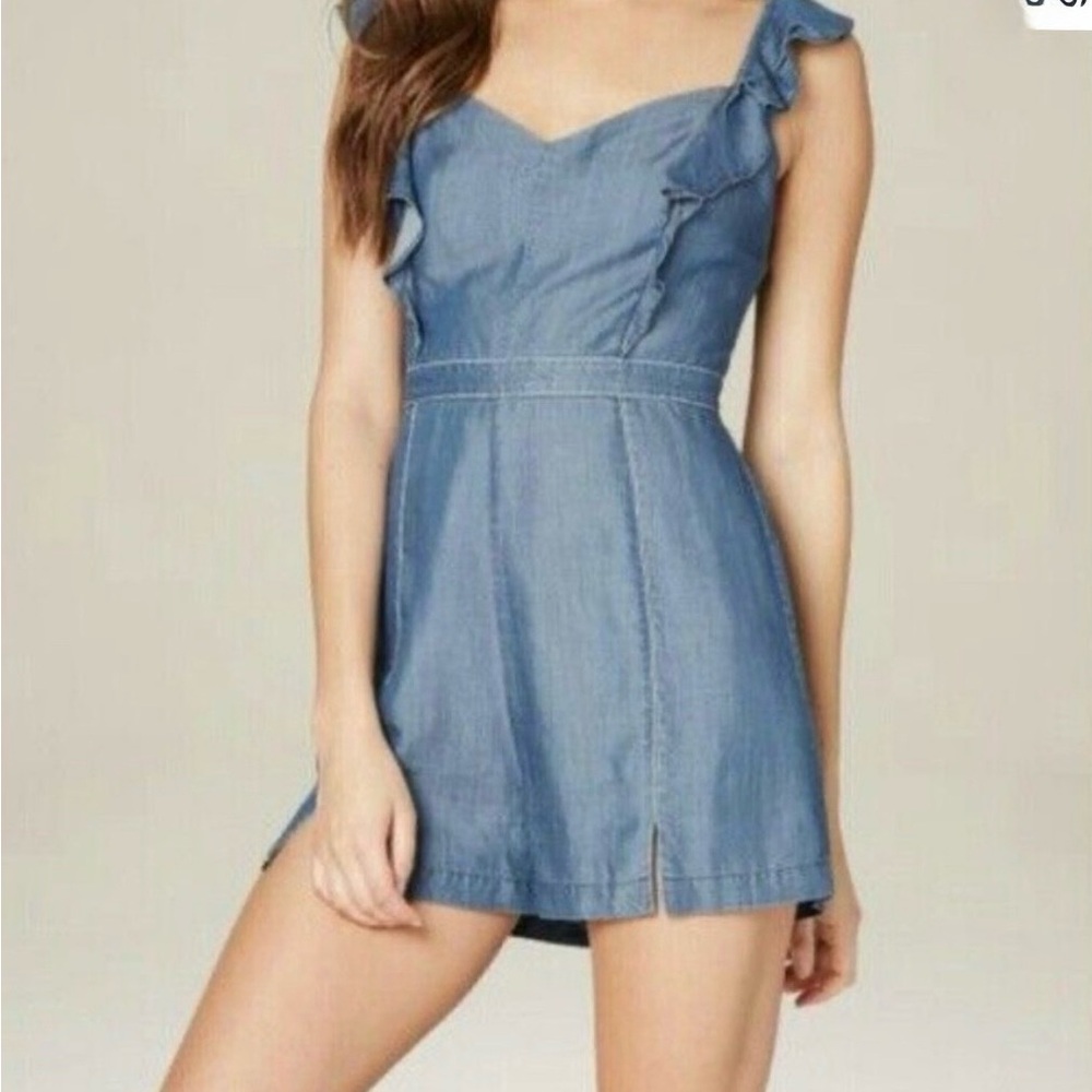 Blue chambray ruffle romper